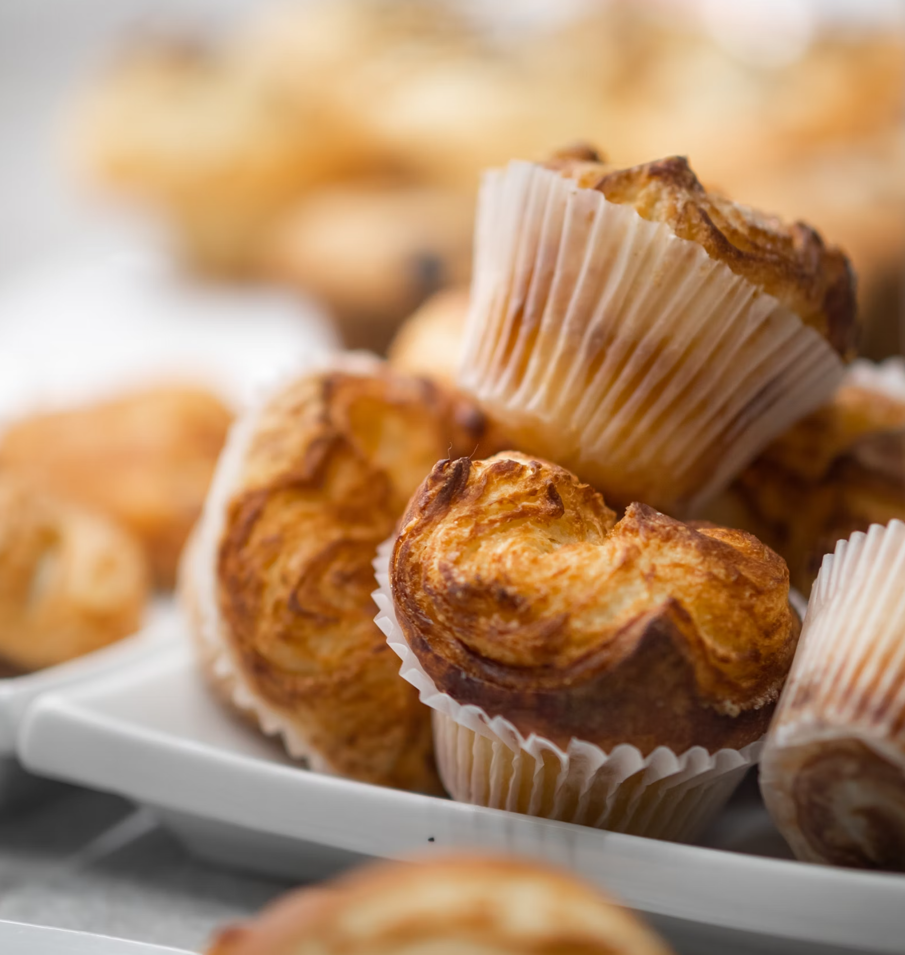 Assorted muffins in a white plate