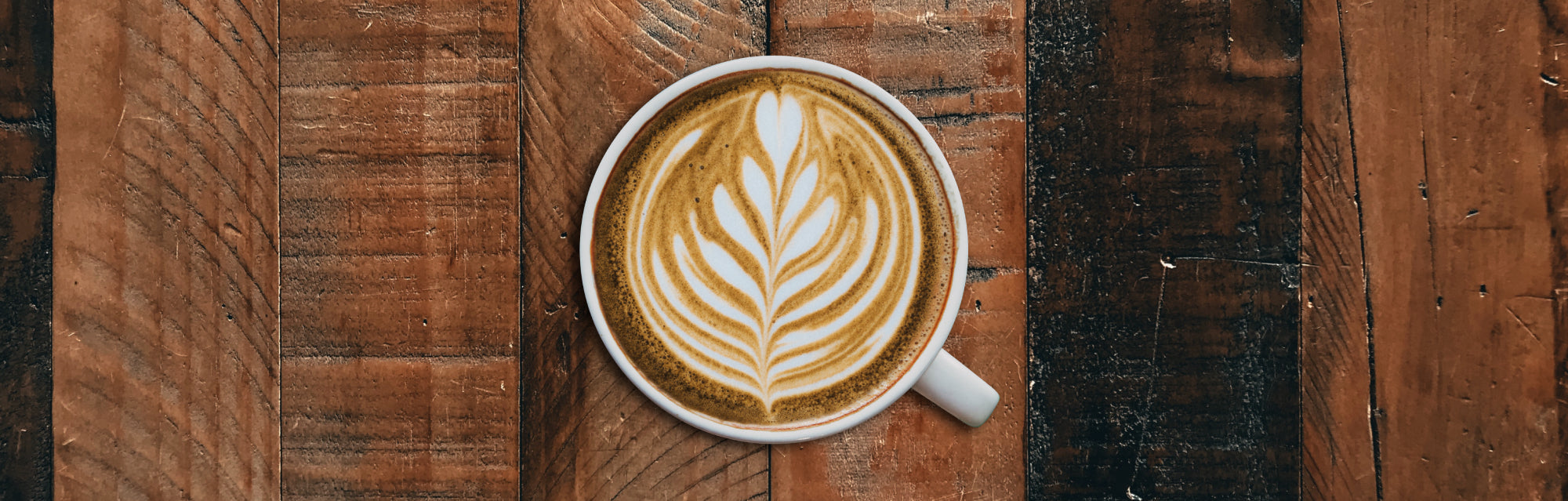 Top view of a leaf pattern in a latte